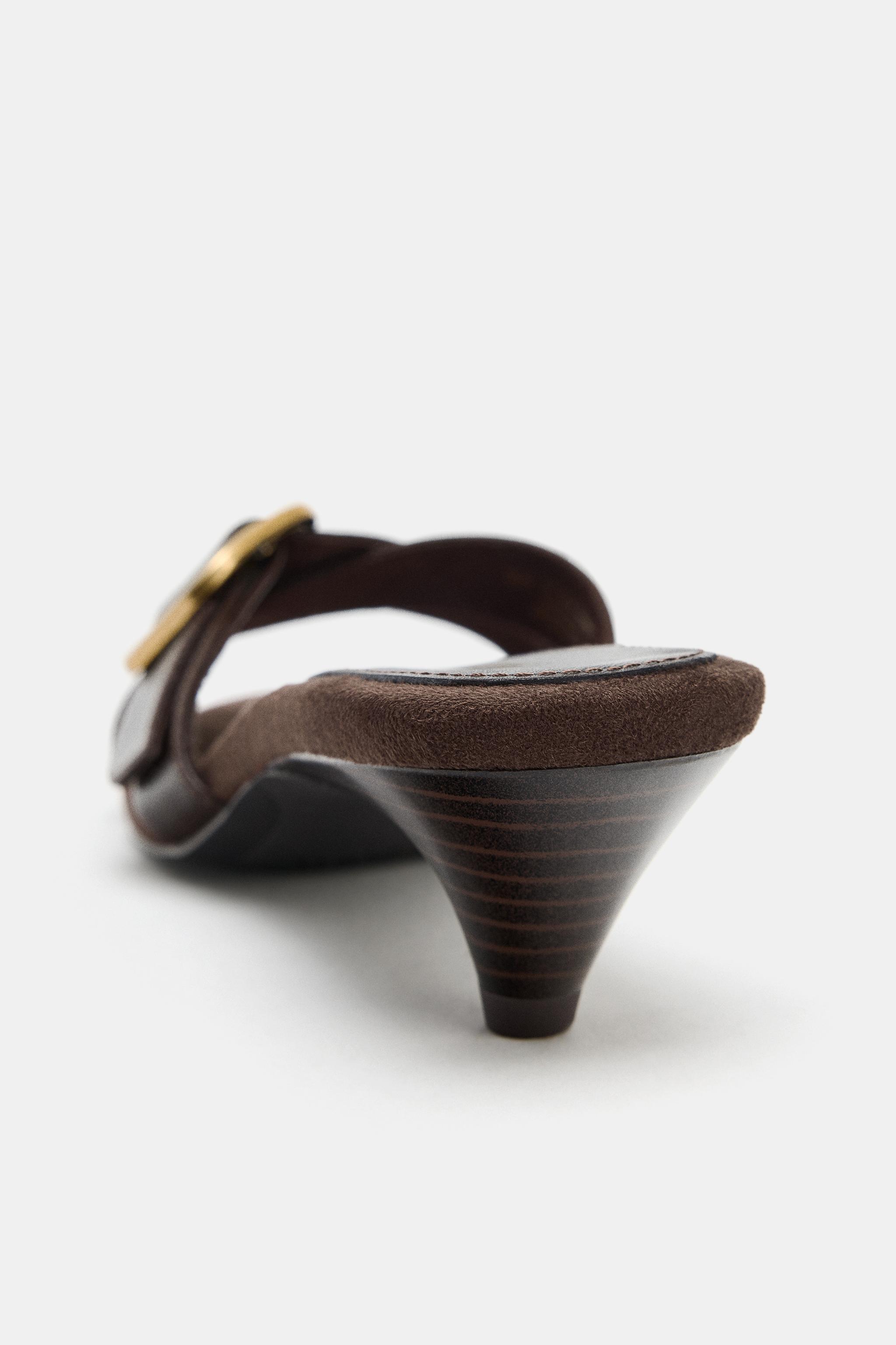 BUCKLED LEATHER SANDALS